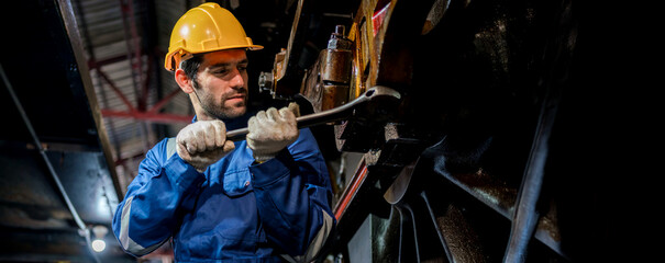 Engineer checking construction process railway and checking work on railroad station . Railway engineer checking machines in train station. Train engineer concept