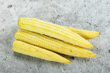 Raw sweet baby corn heap