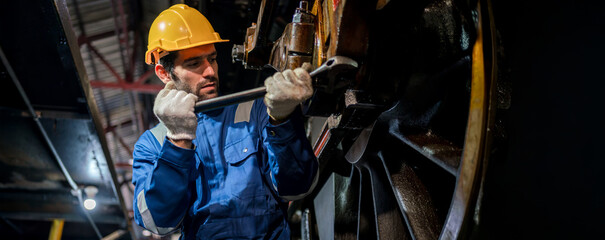 Engineer checking construction process railway and checking work on railroad station . Railway engineer checking machines in train station. Train engineer concept