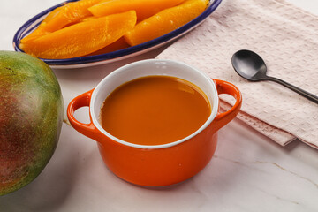 Sweet mango puree in the bowl