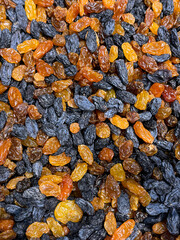 Raisins mix blue and golden sweet dried grape I