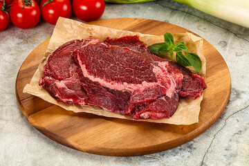 Raw beef cheeks cut for cooking