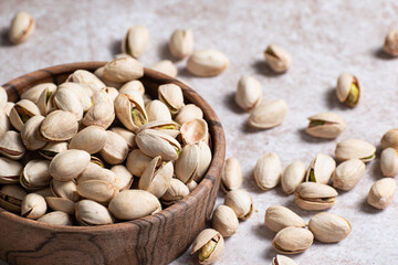 Pistachio vera, pistachio nuts, peeled pistachio nuts close-up on the table, healthy food, Tasty roasted pistachios, crunchy snack for healthy eating.