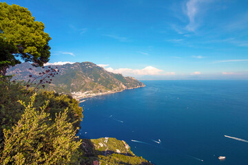 The photo showcases the scenic villas of Ravello and its surroundings, set atop cliffs with panoramic views, lush gardens, and charming architecture that capture the essence of Italy’s Amalfi Coast.