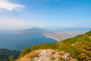 The photo offers a panoramic view of Naples from Monte Molare, overlooking the city and coastline...