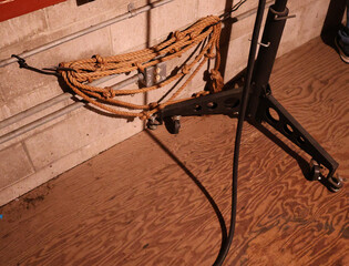 A rope hanging on a wall.