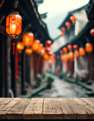 Obraz premium Empty Wooden Table with Ancient Chinese Town Background for product presentation display mock up podium, Hanging Asian Lanterns, traditional Chinese decorations, ad, podium platform