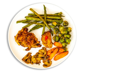 Real, strong, healthy, nutritious food, grilled chicken, pimenta biquinho, asparagus, mushrooms, Brussels sprouts and carrots.