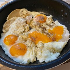fried egg in a frying pan. Breakfast in the morning.