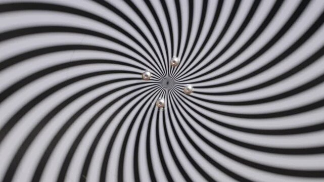 mesmerizing video featuring a hypnotic spiral pattern rotating endlessly, evoking a sense of infinity and visual allure. Perfect for use in creative projects, visual effects, artistic installations, 