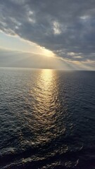 Obraz premium Sunrise at sea. The sun and clouds. A sunny path. Sky. Ibiza, travel, sea, sun catamaran,tour,tour booking, cruise, island