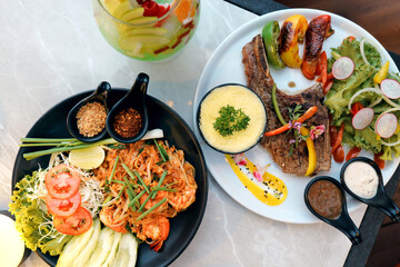 Delicious gourmet dishes served on a stylish table, showcasing vibrant colors and textures.