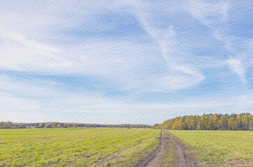 Road runs through a field with trees in the background