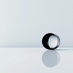 A minimalistic scene of a metal lens on a smooth white surface, reflections enhancing its curves, lens minimalism, clean composition