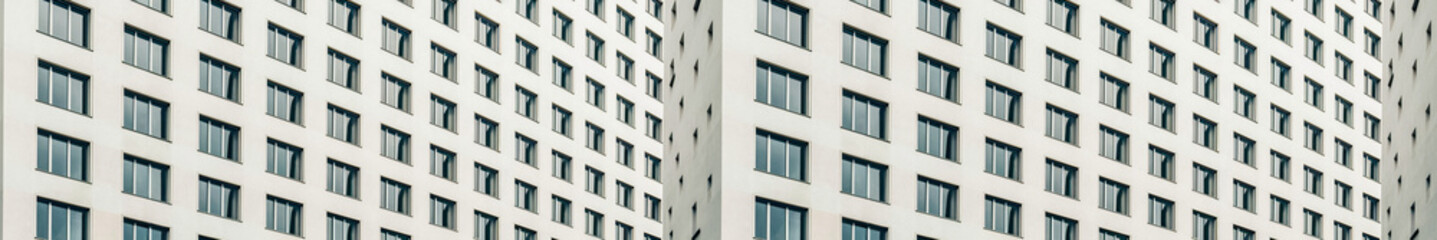 Close-up view of modern building facade with windows