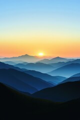 Fototapeta premium Sunrise over layered mountains creates stunning morning landscape