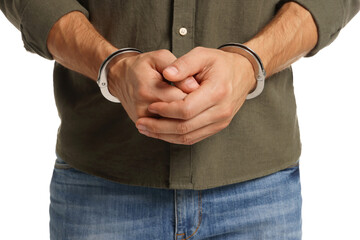 Man in metal handcuffs on white background, closeup