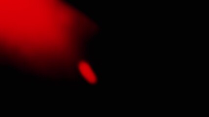 Dynamic red light beam on a black background, appearing and disappearing, creating a dramatic and mysterious effect. Perfect for intros, transitions, or highlighting key moments.