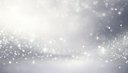 Fototapeta premium A white gradient background adorned with glittering silver sparks and a faint watercolor wash, creating a soft, magical atmosphere perfect for festive designs.
