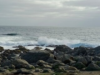 waves crashing on rocks