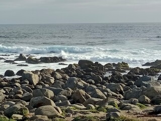 waves crashing on rocks