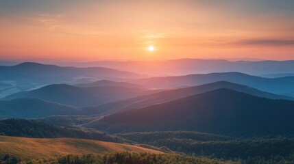 Obraz premium Majestic Sunset Over Rolling Mountain Ranges