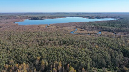A huge lake formed after the ice age, surrounded by impenetrable forest, rivers, mountains. Nature...