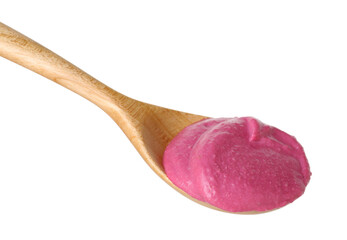 Tasty beetroot hummus in wooden spoon isolated on white