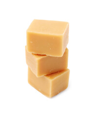 Stack of tasty sweet caramel candies isolated on white
