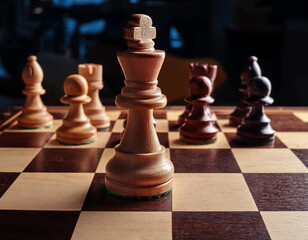 Show a chessboard where pieces are moved mid-game to counter an unexpected change