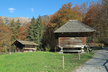Traditional swiss country houses in the open-air museum of Ballenberg. Autumn alpine landscape. Municipality of Hofstetten bei Brienz, canton of Bern, Switzerland.