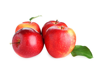 Many fresh red apples and green leaves isolated on white