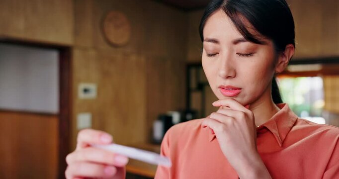 Woman, pregnancy test and thinking in home, sad or negative results with anxiety in morning. Person, infertility and mental health with check for family planning, IVF or maternity fail in Japan