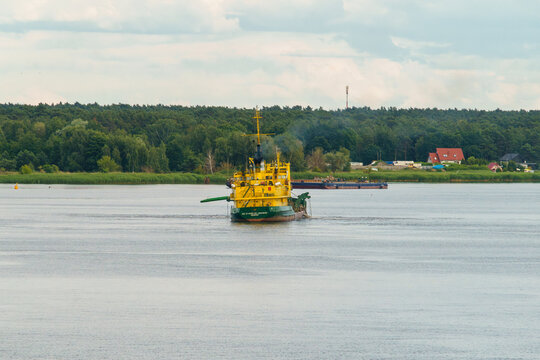 Świnoujście, Western Pomerania, Poland - 13 June 2024: Polish hopper dredger Eng. Stanislaw Lęgowski at work on the Swina River