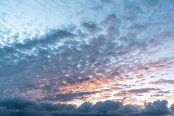 Vibrant Sunset with Cloud Layers and Colorful Sky © C P
