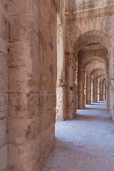 Old archaeological corridors and arcades built of stone bricks