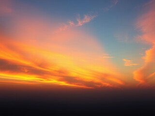 Obraz premium Vibrant red sunset over the horizon with a spectrum of colors in the sky, dusk, natural