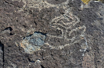 Petroglyph National Monument protects 1 of the largest petroglyph sites in North America designs and symbols carved on volcanic rocks by Native Americans & Spanish settlers  Albuquerque, New Mexico