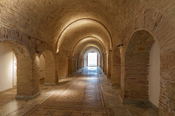 Beautiful arched vaults made of stone masonry create a room
