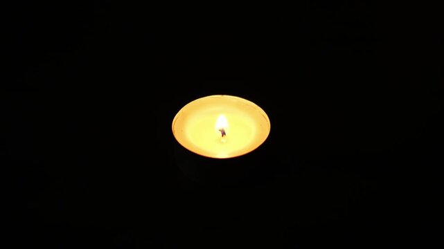 A candle on a black background,4k