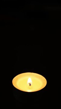 A candle on a black background,4k