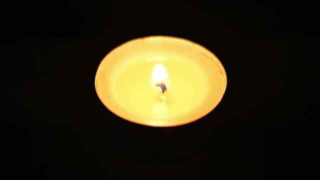 A candle on a black background,4k