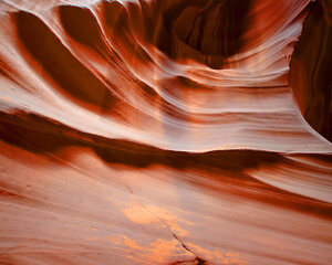 Antelope Canyon is a slot canyon in the American Southwest. It is on Navajo land east of Page, Arizona. Antelope Canyon includes two separate, scenic slot canyon sections