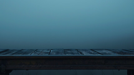 Tranquil Misty Scene with Weathered Wooden Dock and Soft Blue Background, Evoking Calmness and Reflection in a Serene Environment