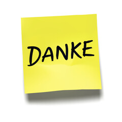 German word ‘Danke’ (Thank You) written on yellow sticky note with cast shadow 