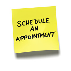 &lsquo;Schedule an Appointment&rsquo; written on yellow sticky note with cast shadow 