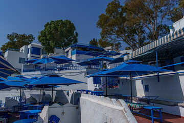 view of the cafe umbrellas, with a beautiful view