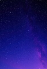 Fototapeta premium starry night sky with a purple and blue sky