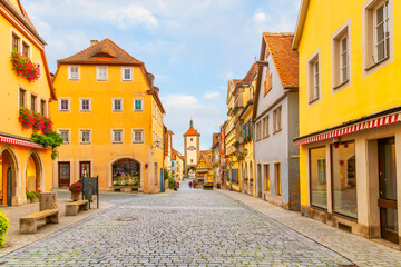 The picturesque Plönlein Little Square and Siebersturm Clock Tower, a popular tourist destination in the Bavarian village of Rothenburg ob der Tauber, Germany.	