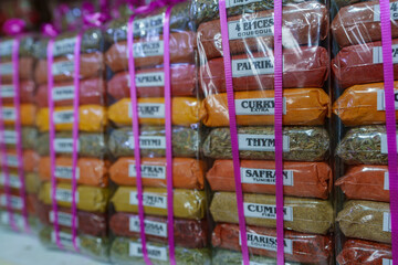 Piles of spices, packed in foil packages